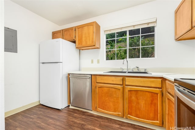 kitchen featuring dark wood-type flooring, stainless steel appliances, electric panel, and sink