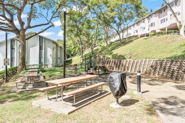 view of yard featuring playground community