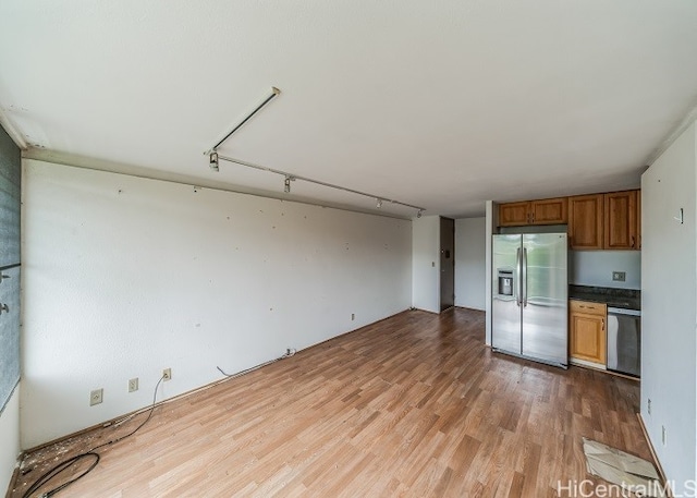 kitchen featuring hardwood / wood-style floors and stainless steel appliances