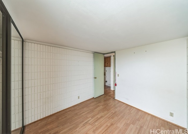 empty room featuring light wood-type flooring