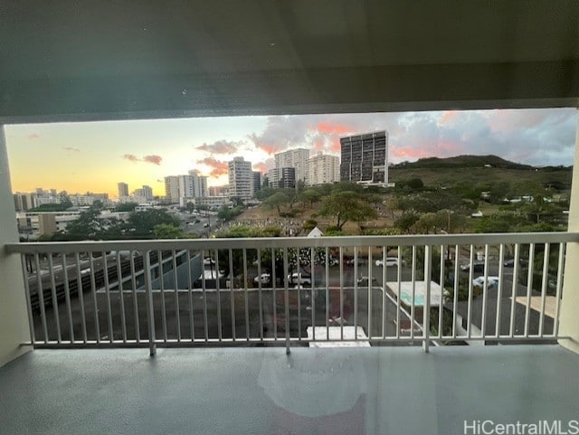 view of balcony at dusk