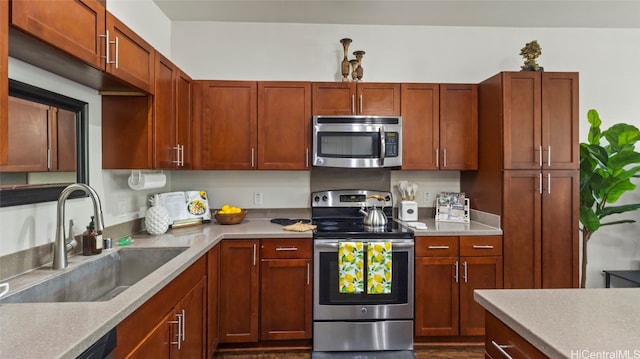 kitchen featuring appliances with stainless steel finishes and sink