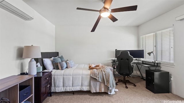 carpeted bedroom featuring a wall mounted air conditioner and ceiling fan