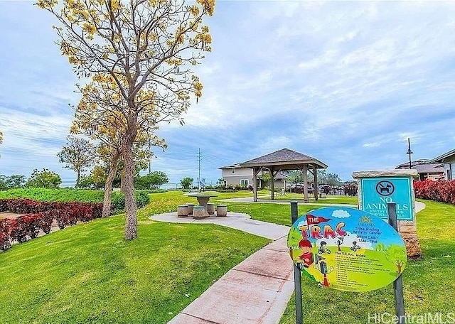 view of community featuring a gazebo and a yard