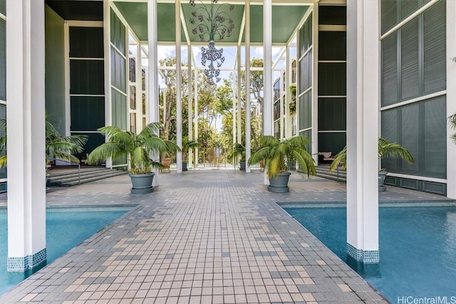 view of swimming pool with a patio