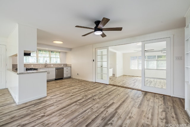 kitchen with dishwasher, ceiling fan, light wood-style flooring, and white cabinetry