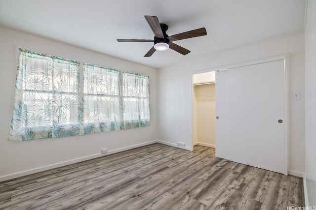 2340 University Ave, Honolulu, HI 96822 - unfurnished bedroom featuring wood finished floors, a closet, and ceiling fan