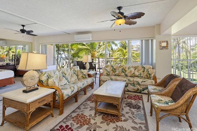 sunroom with an AC wall unit and ceiling fan