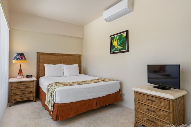 bedroom with light carpet and an AC wall unit