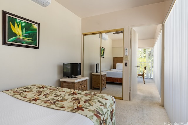 bedroom with light carpet and a closet