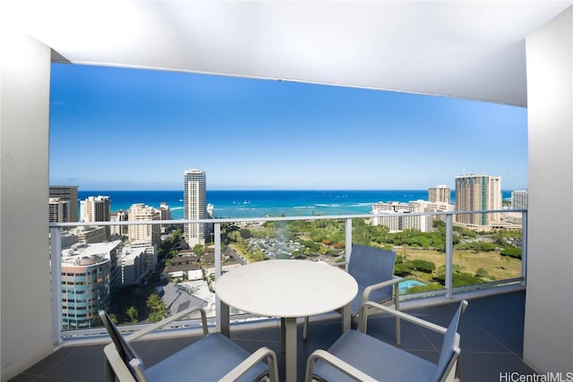 balcony featuring a water view