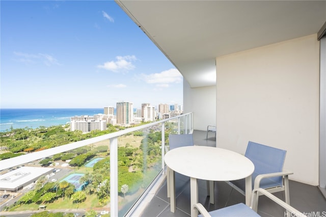 balcony featuring a water view