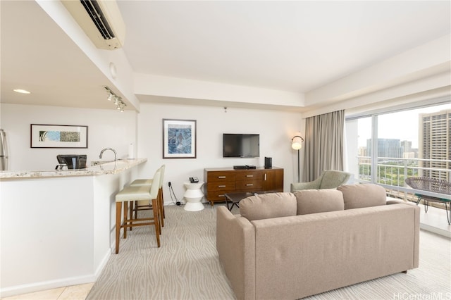 living room with light carpet and a wall unit AC