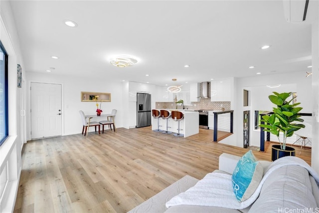 living room with light hardwood / wood-style floors