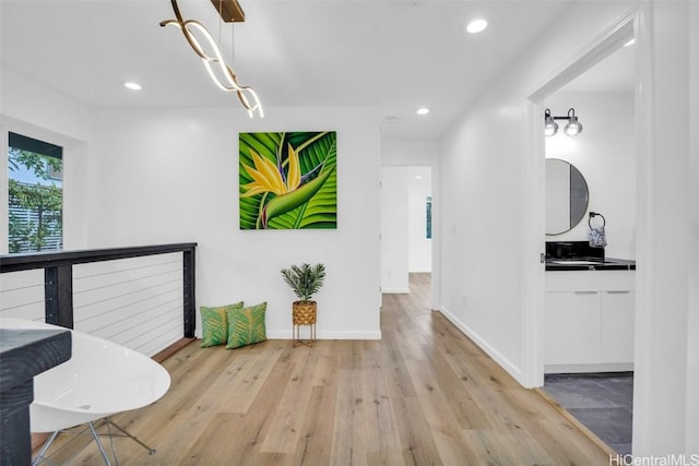 hallway featuring light hardwood / wood-style flooring