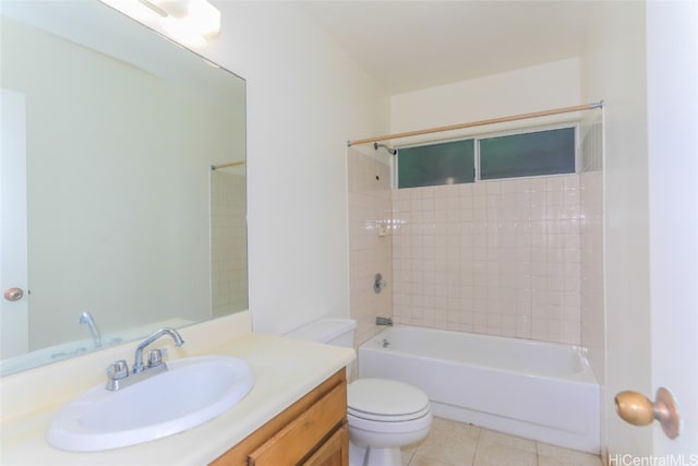 full bathroom with toilet, tiled shower / bath combo, vanity, and tile patterned flooring