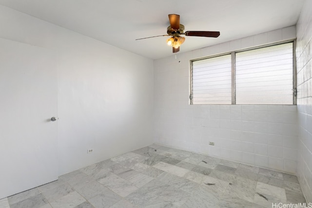 empty room with ceiling fan