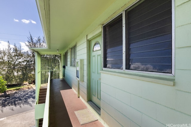 view of property exterior with covered porch