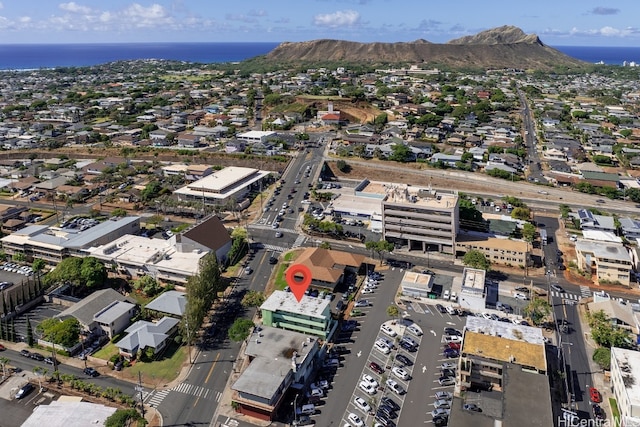 aerial view featuring a water and mountain view