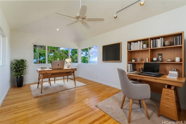 office area with ceiling fan, light hardwood / wood-style floors, lofted ceiling, and rail lighting