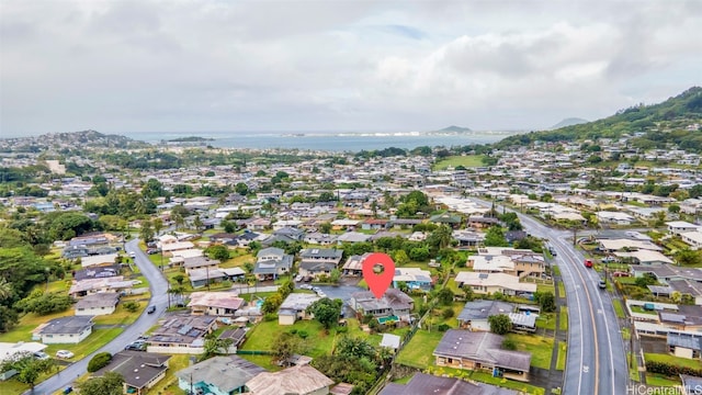 bird's eye view with a water and mountain view