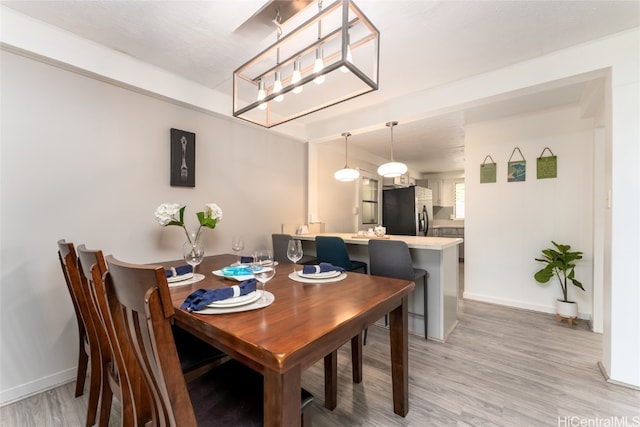 dining room featuring wood-type flooring