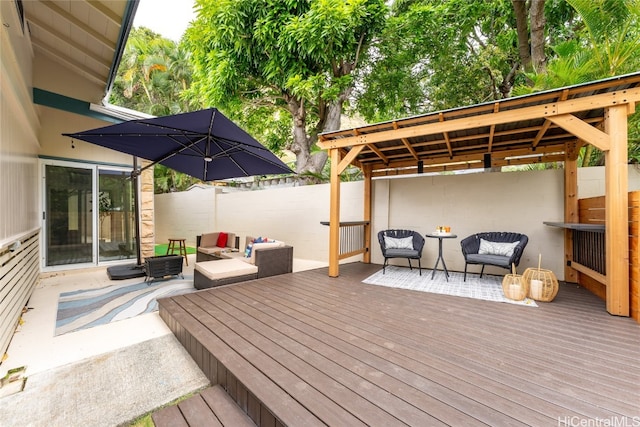 wooden deck with an outdoor living space