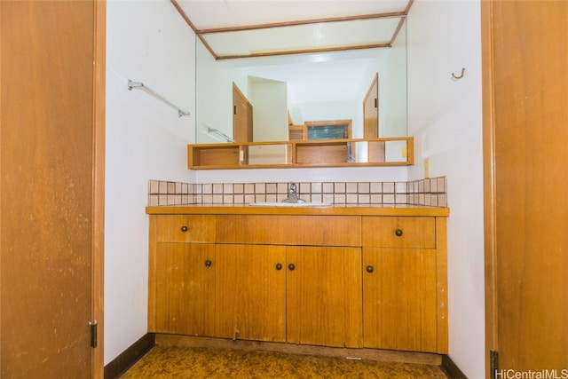 bathroom with vanity and concrete floors