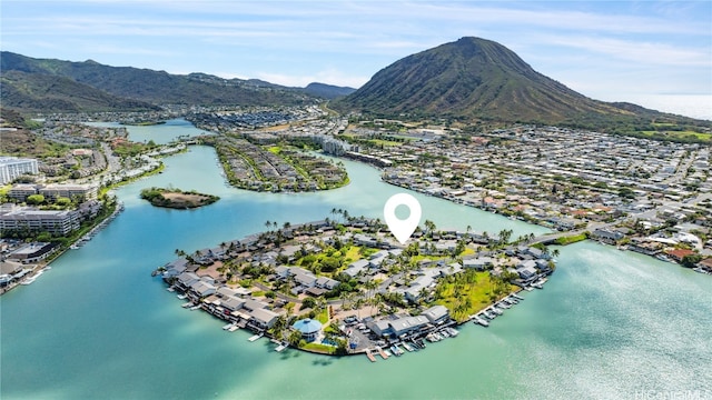 bird's eye view with a water and mountain view