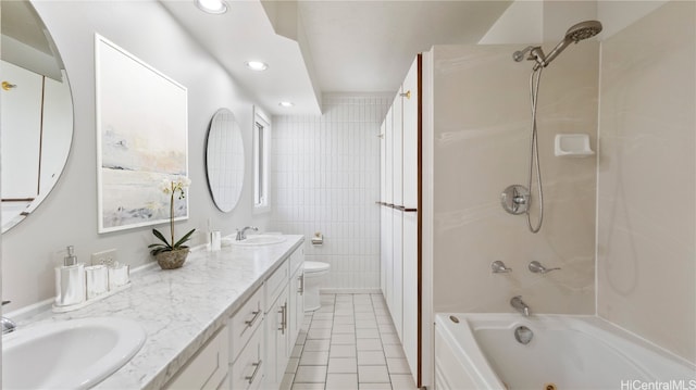 full bathroom featuring bathing tub / shower combination, vanity, tile patterned floors, and toilet