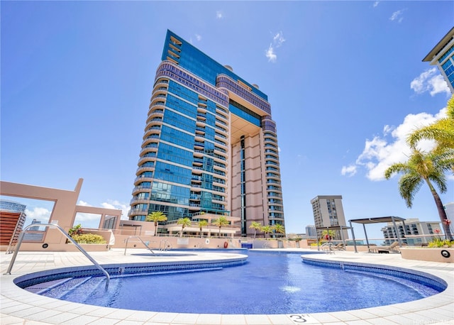 1888 Kalakaua Ave Unit 907, Honolulu, HI 96815 - community pool featuring a patio area