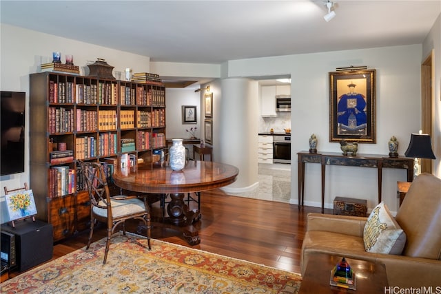 dining area with wood-type flooring