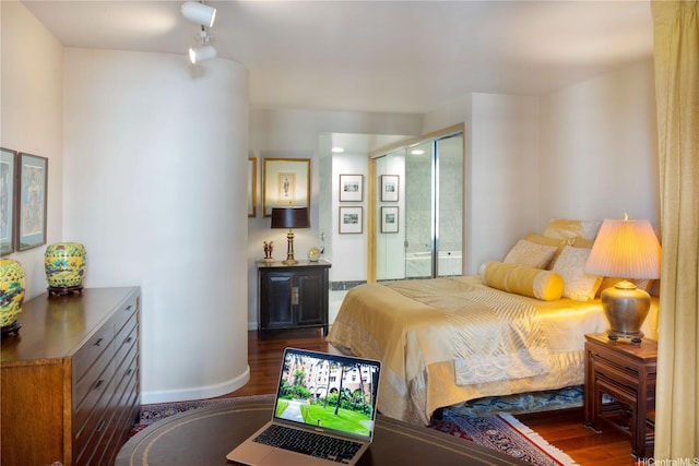 1888 Kalakaua Ave Unit 907, Honolulu, HI 96815 - bedroom with wood finished floors and baseboards