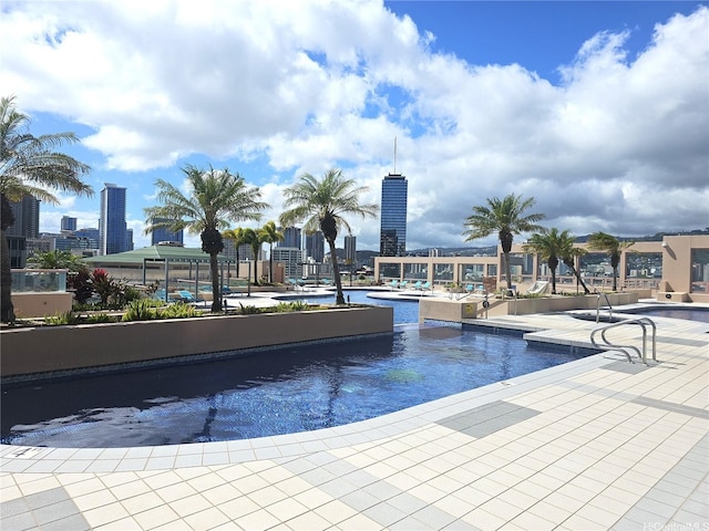 1888 Kalakaua Ave Unit 907, Honolulu, HI 96815 - community pool with a patio area