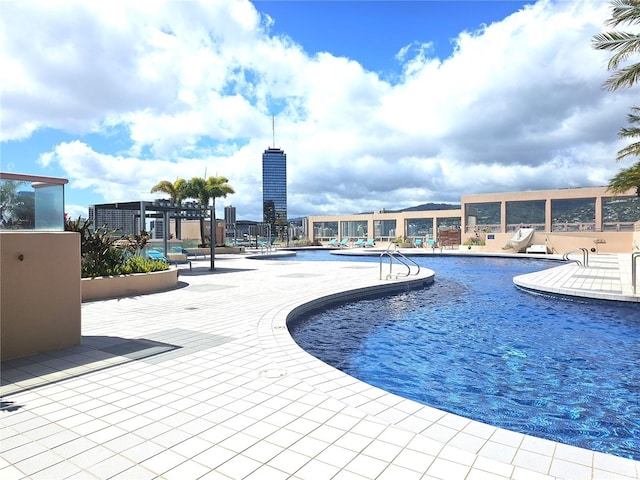 1888 Kalakaua Ave Unit 907, Honolulu, HI 96815 - community pool with a patio