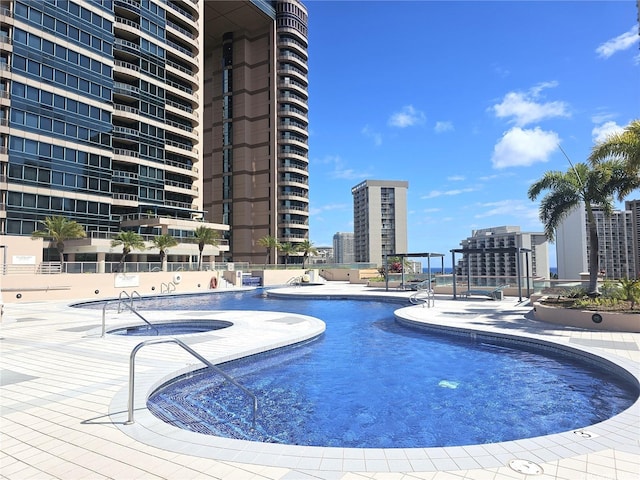 1888 Kalakaua Ave Unit 907, Honolulu, HI 96815 - community pool with a patio and a view of city