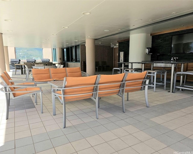 1888 Kalakaua Ave Unit 907, Honolulu, HI 96815 - view of patio featuring an outdoor living space and outdoor dining area