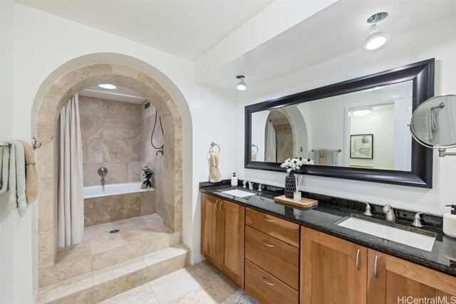 bathroom with vanity, plus walk in shower, and tile patterned flooring