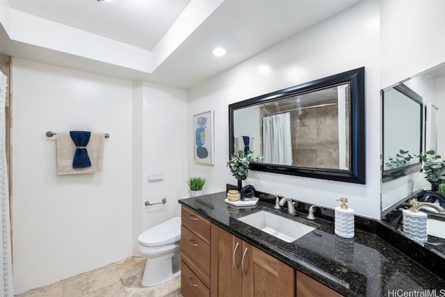 bathroom featuring vanity, toilet, tile patterned floors, and a shower with shower curtain