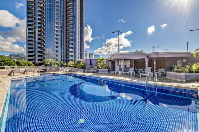 view of pool with a patio