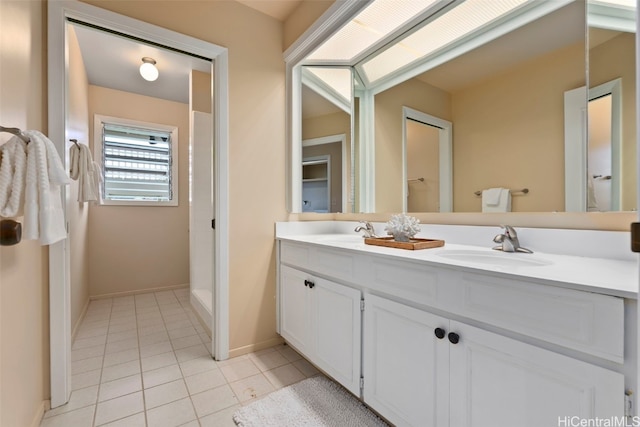 bathroom with vanity and tile patterned floors