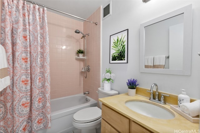 full bathroom featuring vanity, toilet, and shower / bathtub combination with curtain