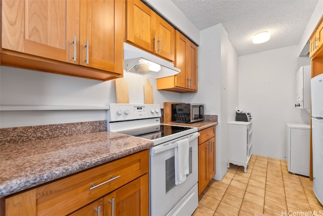 kitchen with white range with electric stovetop, stone countertops, a textured ceiling, and light tile patterned floors