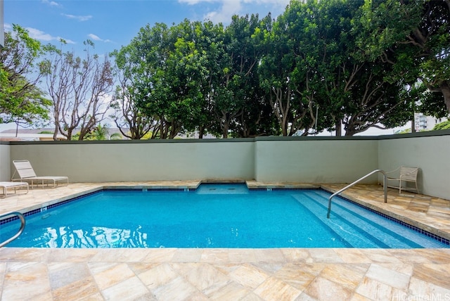 view of pool with a patio