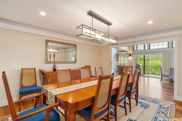 dining space featuring hardwood / wood-style flooring