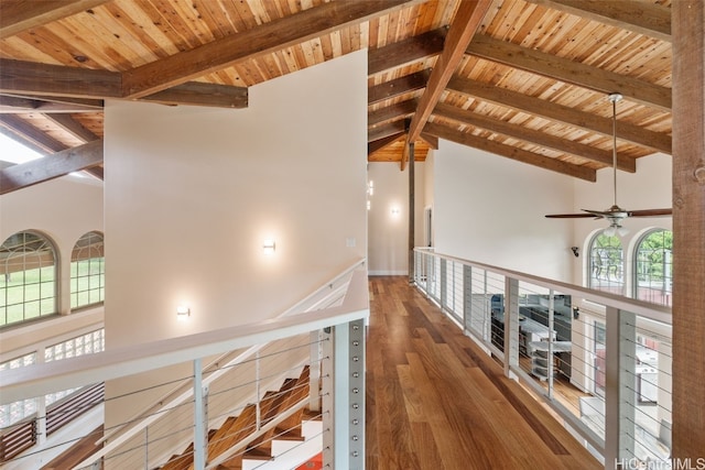 corridor featuring beam ceiling, wood ceiling, high vaulted ceiling, and dark hardwood / wood-style flooring