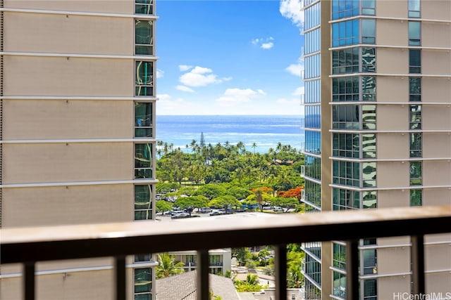 balcony featuring a water view