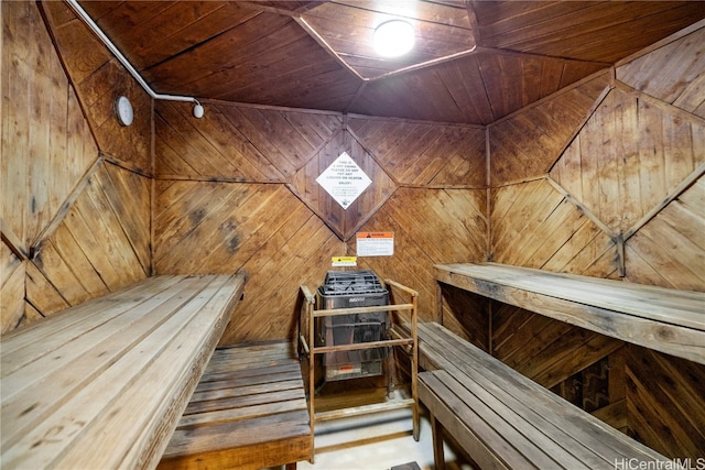 view of sauna / steam room with wood walls and wooden ceiling