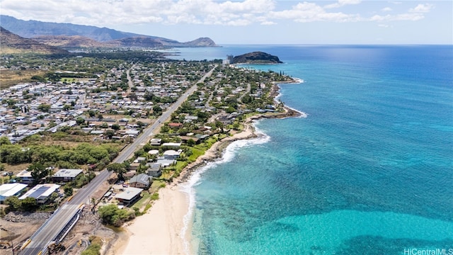 bird's eye view with a water and mountain view and a beach view