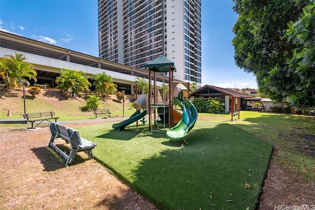 view of play area featuring a yard